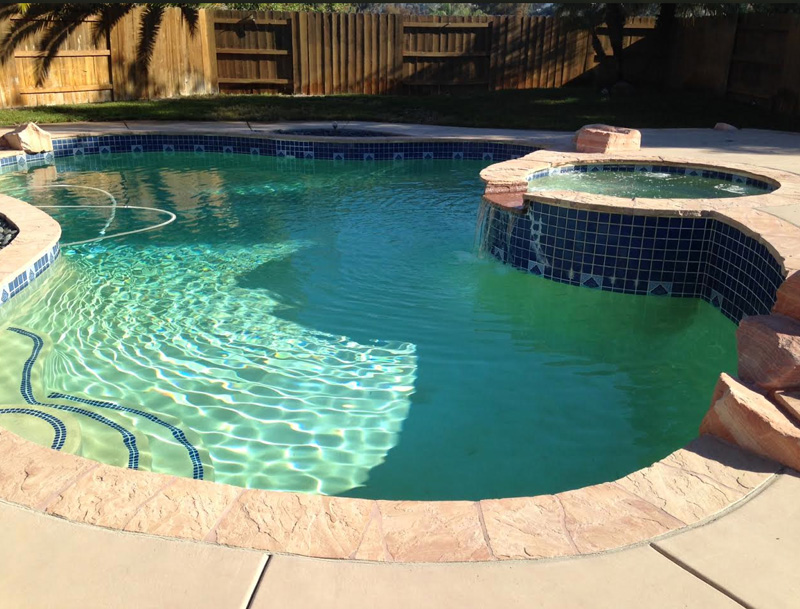 Before-Spa and Pool with new paver deck